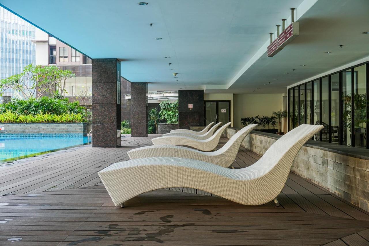 Homey And Modern Tamansari Semanggi 2Br Apartment By Travelio Джакарта Екстериор снимка